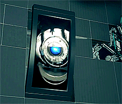 GIF of Wheatley being broadcasted by one of his monitors as he hovers around slightly.