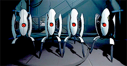 GIF of 4 turrets moving their wing-like side panels as they sing a song written by Glados for Chell at the end of Portal 2